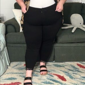 TORRID black lace edge skinny jeans
